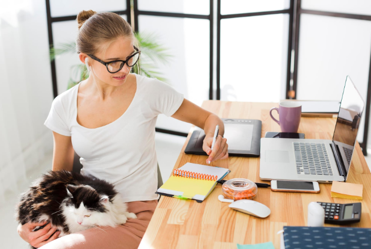 Veterinary Front Desks woman and cat
