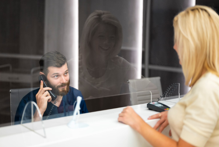 nurse vet receptionist talking on phone 